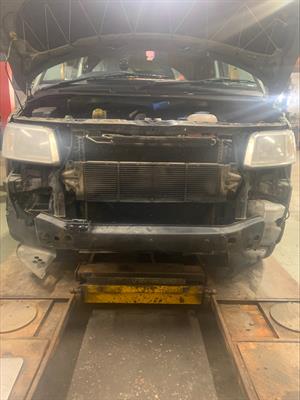 Front bumper removed showing defective intercooler